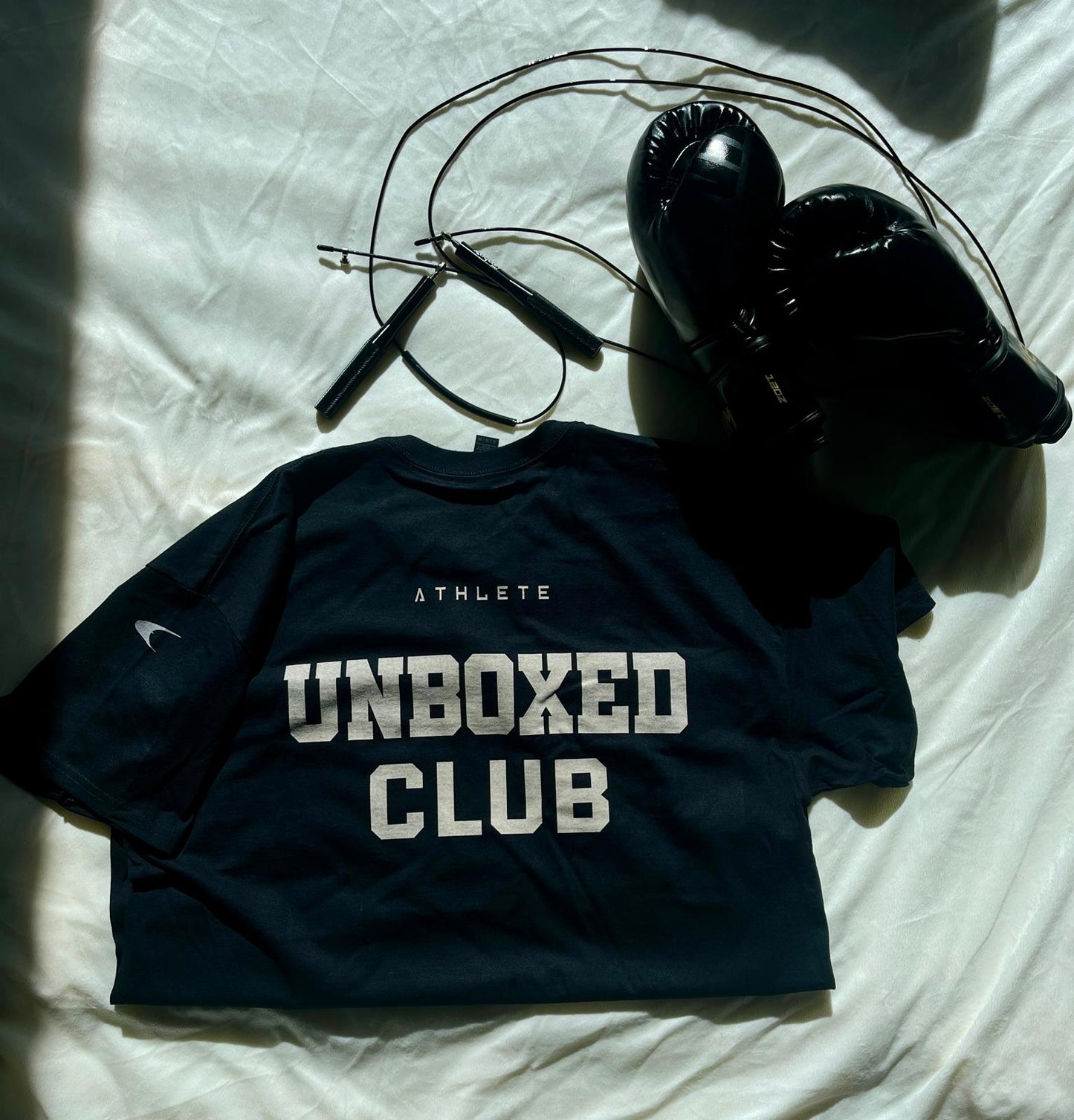 Schwarzes t-Shirt Kampfsport Boxen Kickboxen Unboxed Club